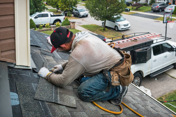 Professional Roofing technician working in Marion, MA